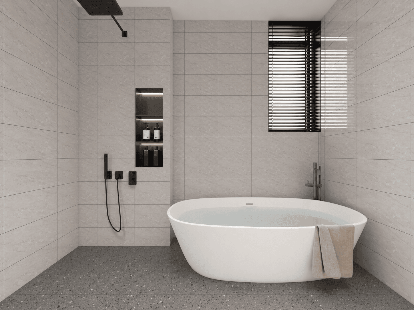 Modern bathroom with elegant freestanding soaking tub and grey tiles